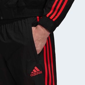 Adidas red and black windbreaker pants
